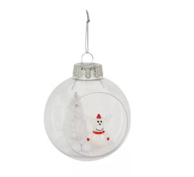 Karácsonyfadísz (átlátszó gömbben fehér karácsonyfa fehér rénszarvassal)